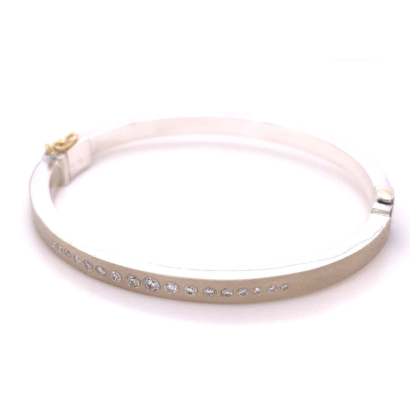 STERLING SILVER AND 18K YELLOW GOLD DIAMOND BRACELET