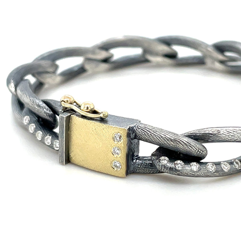 STERLING SILVER AND 18K YELLOW GOLD DIAMOND BRACELET